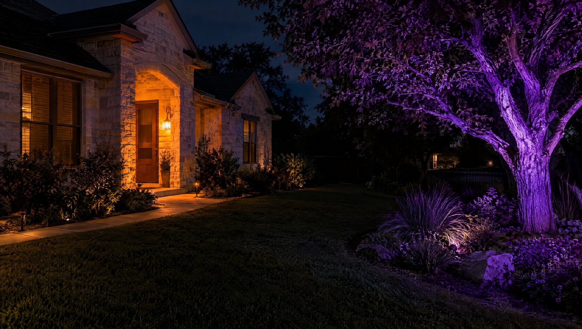 Orange-lit Halloween doorway beside a purple-lit garden with a dark gap between colors